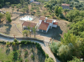 Villa Melles, bestaande uit een hoofdgebouw en een gastenverblijf Bosco